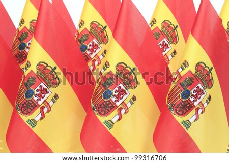 Spain flags hanging on the flagstaff