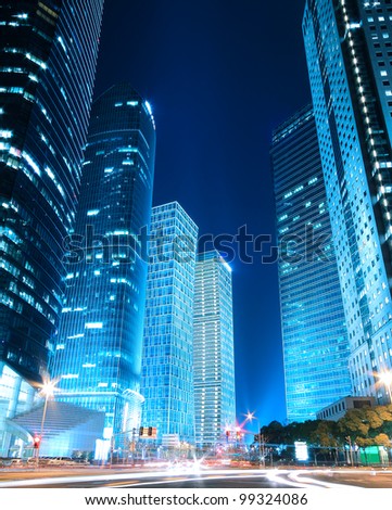 Dreamy blue of modern office buildings at night in Shanghai Far East