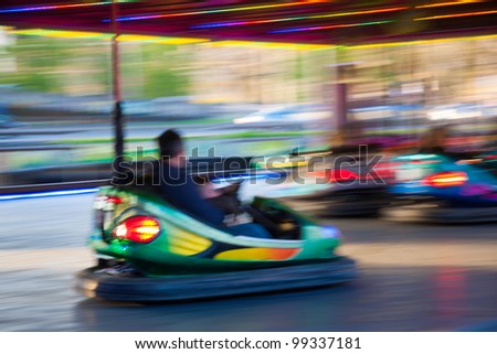 Bumper Cars - blurred intentionally Royalty-Free Stock Photo #99337181
