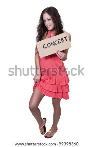 A beautiful woman with a sign hitch hiking to a concert