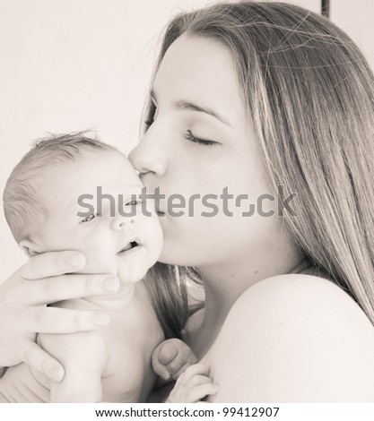 picture of happy young mother with newborn baby