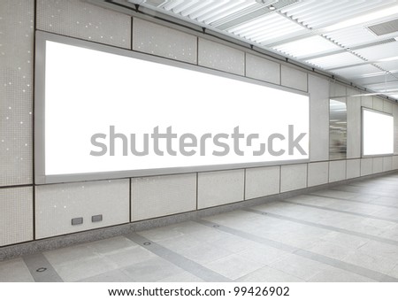 Blank billboard in the city building, shot in subway station, white empty copy space is great for user