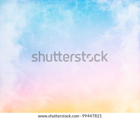 Fog and clouds on a colorful rainbow blue to orange gradient.  Image displays a pleasing paper grain and texture at 100%.