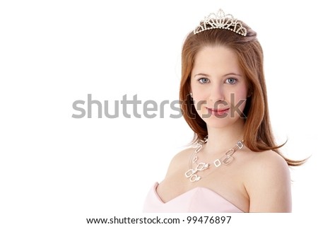 Portrait of beautiful young ginger-haired woman with tiara.