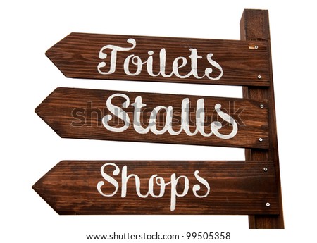 wooden signage indicating toilets, stalls and shopping area (isolated on white background)