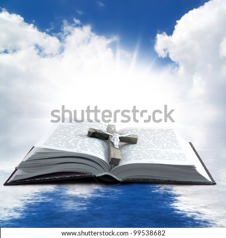 Prayer Holy book on the background of clouds and sun Royalty-Free Stock Photo #99538682