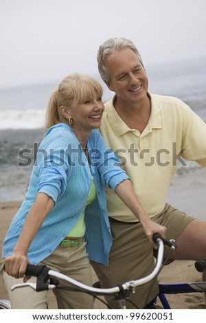 Couple on Bike Ride at Beach