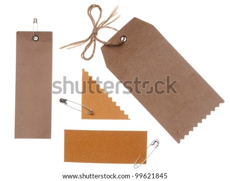 collection of blank cardboard paper labels isolated on the white background