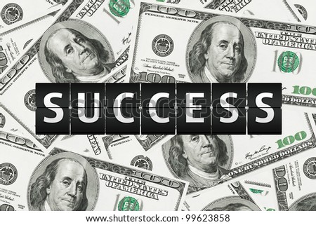 Success concept. Flipping Sign on a money background
