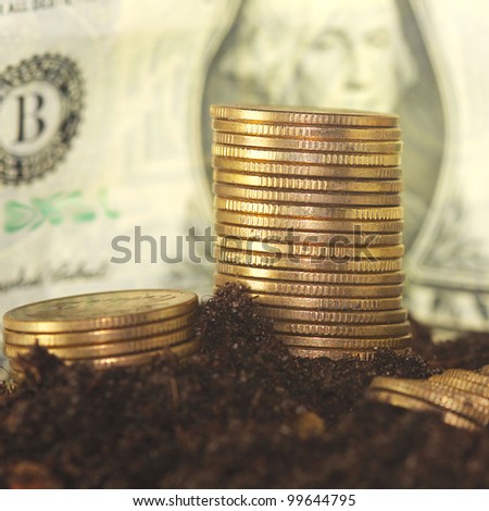 Stock gold coins and dollar