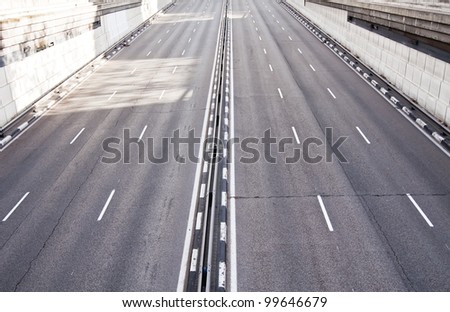 Dual carriageway with six lanes Royalty-Free Stock Photo #99646679