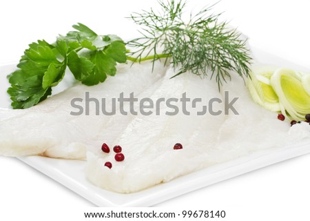 Two Halibut fillets on a white plate
