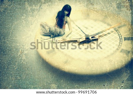 Young woman want to stop time. Old style image