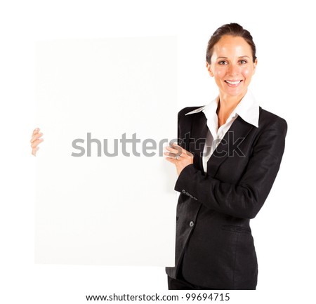 happy businesswoman holding white board