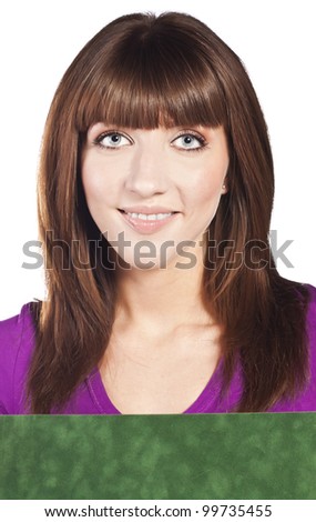 Beautiful, smiling woman holding white card