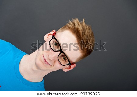 Young man on black background