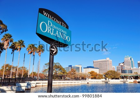 Orlando downtown welcome sign with tropical scene Royalty-Free Stock Photo #99801884