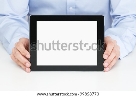 Office worker holding blank digital tablet with clipping path for the screen