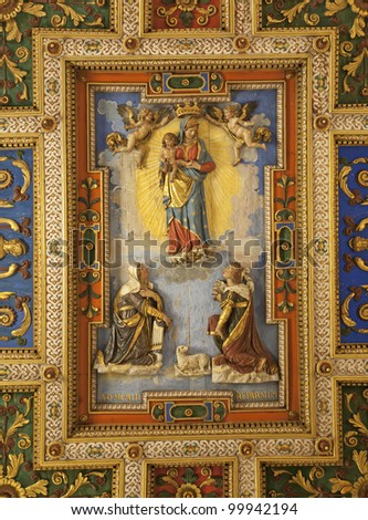  Rome - roof of church Santa Francesca Romana with virgin Mary