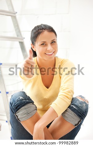 bright picture of lovely housewife making repairing works