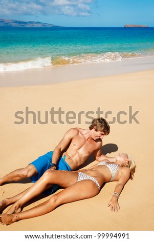 Attractive Young Couple on Tropical Beach