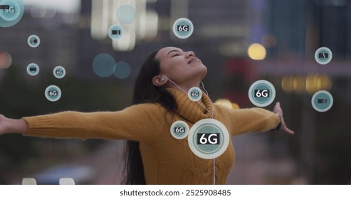 Image of 5g and 6g texts over biracial woman listening to music while enjoying breeze. Digital composite, multiple exposure, telecommunication, futuristic and technology concept. - Powered by Shutterstock