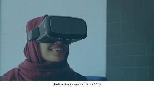 Image of 6g text, scopes scanning and data processing over woman in hijab wearing vr headset. global networking, technology and digital interface concept digitally generated image. - Powered by Shutterstock