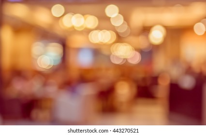 Image Of Abstract Blur Retail Shop With Light Bokeh For Background Usage . (vintage Tone)