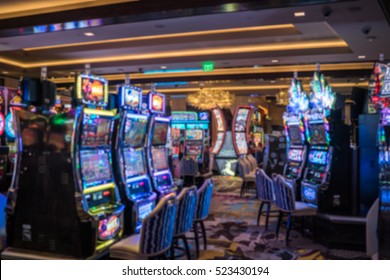 Image of abstract blur slot machine in Las Vegas casino for background usage