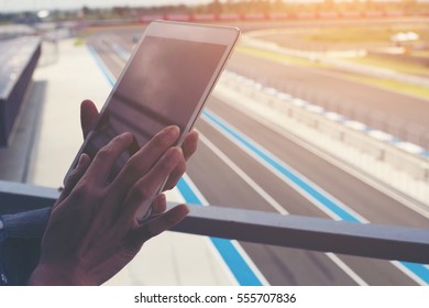 Image ads are playing on the tablet race. - Shutterstock ID 555707836