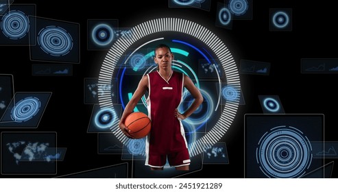 Image of african american female basketball player over scope scanning on black background. sport, connections and digital interface concept digitally generated image. - Powered by Shutterstock