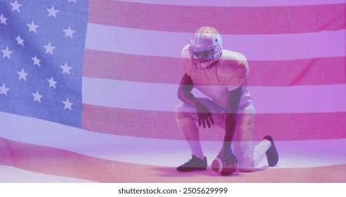 Image of african american american football player kneeling with ball and flag of usa. American patriotism, sports and competition concept digitally generated image. - Powered by Shutterstock