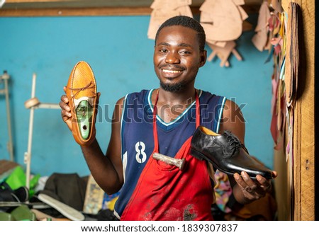 image of african man, with foot wear-workshop concept