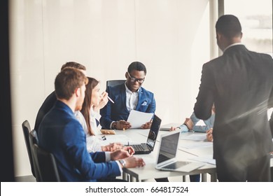 Image Of African-American Business Leader In Working Environment