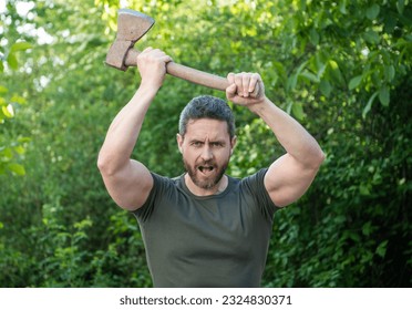 image of aggressive man with axe. aggressive man with axe. aggressive man with axe wearing shirt. - Shutterstock ID 2324830371