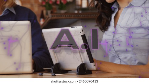 Image of ai text and connections over biracial businesswoman in office. Global artificial intelligence, cloud computing and data processing concept digitally generated image. - Powered by Shutterstock