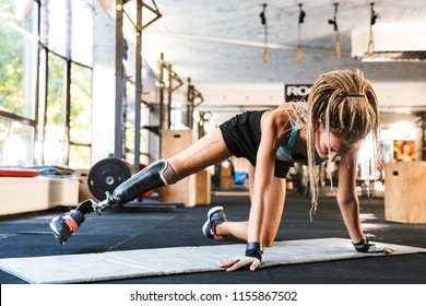 Image Of Amazing Strong Disabled Sports Woman Make Sport Exercises In Gym.