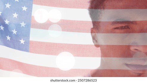 Image of american flag and light spots over half portrait of happy biracial man on sunny beach. America, summer, vacations, wellbeing, celebration and patriotism, digitally generated image. - Powered by Shutterstock