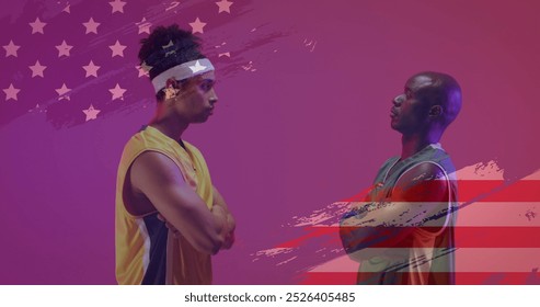 Image of american flag over african american male basketball opponent players facing off. Sport, competition, confidence, flag, team, game, nationality and patriotism digitally generated image. - Powered by Shutterstock