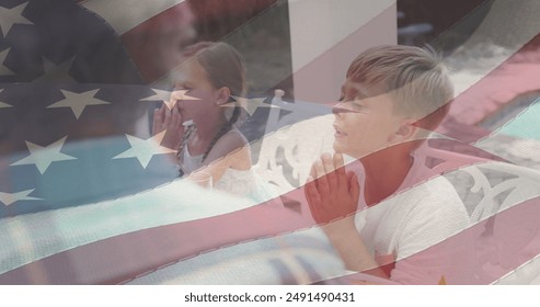 Image of american flag over caucasian family having dinner and praying. patriotism and celebration concept digitally generated image. - Powered by Shutterstock