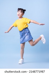 Image Asian child posing blue background
