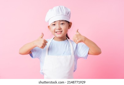 Image Of Asian Child Practicing To Be A Chef