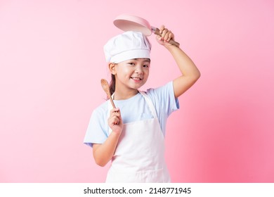 Image Of Asian Child Practicing To Be A Chef