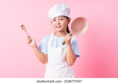 Image Of Asian Child Practicing To Be A Chef