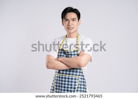 Image of Asian couple posing on white background

