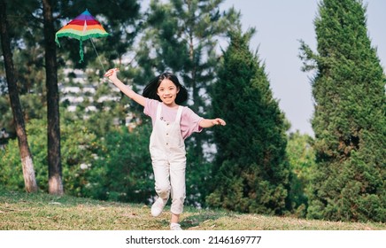 Image Asian Little Girl Playing Kite In The Park