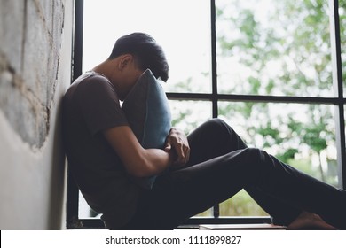 Image Of Asian Man Is Lonely Sad Worry Concept.