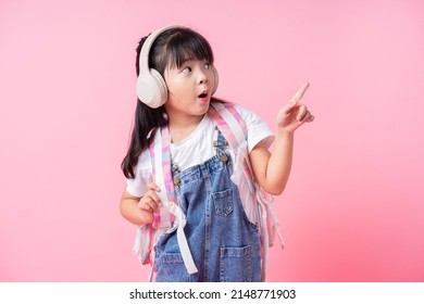 Image Of Asian Primary School Student On Pink Background