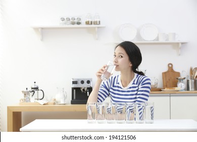 The Image Of Asian Woman Drinking Water