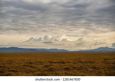 image of the atacama desert with some clouds in the sky